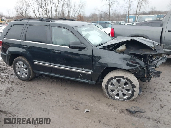 2009 Jeep Grand Cherokee Limited with VIN 1J8HR58T89C541970, listed as a IAAI auction lot 41189623 with 74,161 mi miles. Bid and sale history available at carsss.com. Image 13.