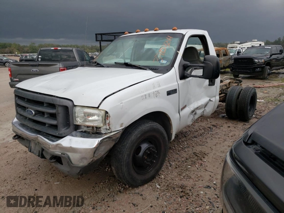 2004 Ford F-350 with VIN 1FDWF36P44EC05243, listed as a Copart auction lot 37153244 with 221,116 mi miles and Salvage title. Bid and sale history available at DreamBid. Image 1.