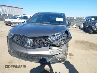 2022 Acura RDX w/A-Spec Package with VIN 5J8TC1H65NL002109, listed as a IAAI auction lot 41132896 with 77,360 mi miles and . Bid and sale history available at carsss.com. Image 2.