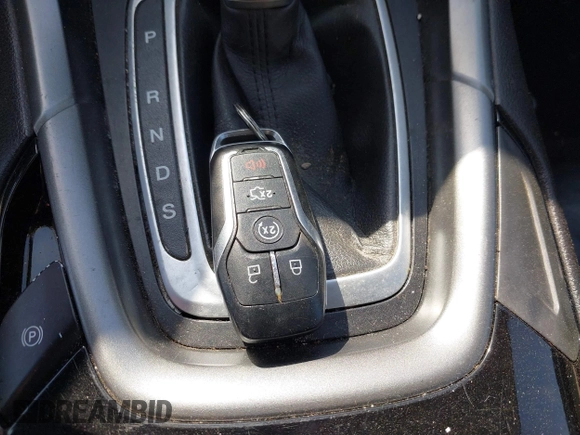 2014 Ford Fusion Titanium with VIN 3FA6P0K93ER277076, listed as a IAAI auction lot 41858755 with 209,233 mi miles and . Bid and sale history available at DreamBid. Image 11.