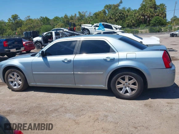 2006 Chrysler 300 Touring with VIN 2C3KA53G56H324954, listed as a IAAI auction lot 42058478 with 124,933 mi miles. Bid and sale history available at carsss.com. Image 14.