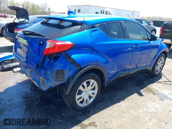 2020 Toyota C-HR LE with VIN JTNKHMBX7L1071287, listed as a IAAI auction lot 42063896 with 76,731 mi miles. Bid and sale history available at carsss.com. Image 4.