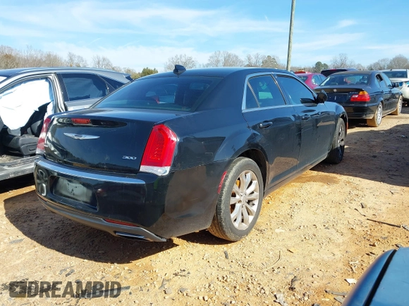 2016 Chrysler 300 Anniversary Edition with VIN 2C3CCARG7GH349399, listed as a IAAI auction lot 41484878 with 146,366 mi miles and . Bid and sale history available at DreamBid. Image 4.
