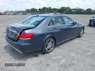 2014 Mercedes-Benz E 350 Sport with VIN WDDHF5KB1EB003911, listed as a IAAI auction lot 41931506 with 59,996 mi miles and . Bid and sale history available at DreamBid. Image 4.