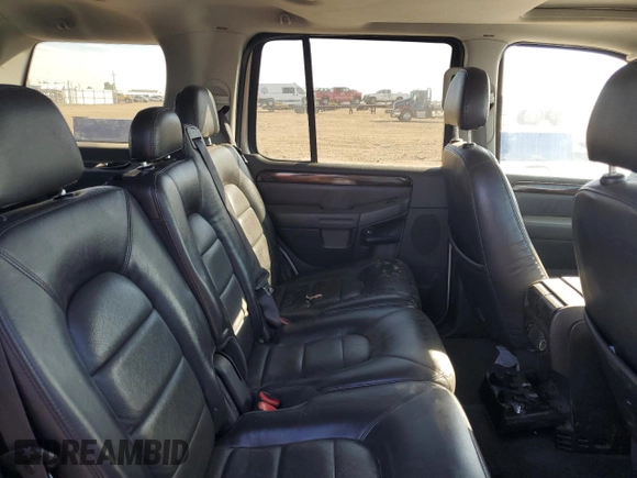 2004 Ford Explorer with VIN 1FMDU75K54UA36401, listed as a Copart auction lot 71855834 with 236,547 mi miles and Salvage title. Bid and sale history available at DreamBid. Image 11.