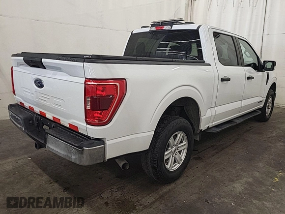 2022 Ford F-150 XL z VIN 1FTFW1ED0NFC41149, wystawiony jako IAAI lot #42785423 z przebiegiem 22 280 mil mil oraz . Historia ofert i sprzedaży dostępna na DreamBid. Obrazek 6.