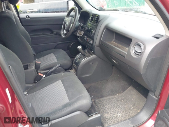 2015 Jeep Patriot Sport with VIN 1C4NJRBB3FD136291, listed as a IAAI auction lot 42015702 with 129,339 mi miles and . Bid and sale history available at carsss.com. Image 5.