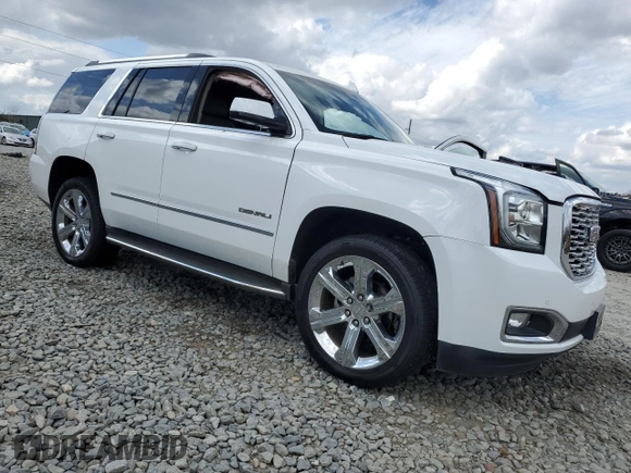 2019 GMC Yukon Denali with VIN 1GKS1CKJ6KR268230, listed as a Copart auction lot 47489035 with 49,549 mi miles and Salvage Title. Bid and sale history available at carsss.com. Image 4.