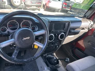 2010 Jeep Wrangler Sahara z VIN 1J4AA5D15AL154750, wystawiony jako Copart lot #55258735 z przebiegiem 157 811 mil mil oraz Czysty tytuł • Clean title. Historia ofert i sprzedaży dostępna na DreamBid. Obrazek 9.