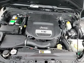 2015 Jeep Wrangler Rubicon with VIN 1C4BJWCG5FL629648, listed as a Copart auction lot 82550674 with 54,853 mi miles and Salvage title. Bid and sale history available at DreamBid. Image 13.