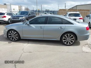 2013 Audi A6 3.0T Prestige with VIN WAUHGAFC4DN126258, listed as a IAAI auction lot 41512291 with 123,298 mi miles. Bid and sale history available at carsss.com. Image 15.