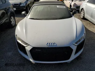 2018 Audi R8 Spyder performance z VIN WUA4BCFX2J7901190, wystawiony jako Copart lot #75090384 z przebiegiem Nie podano mil oraz Nie do naprawy. Historia ofert i sprzedaży dostępna na DreamBid. Obrazek 11.