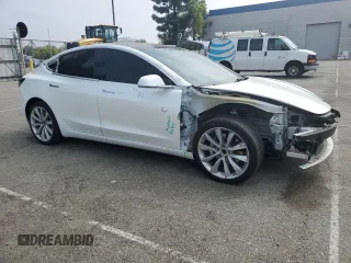 2018 Tesla Model 3 Long Range Battery z VIN 5YJ3E1EA5JF053673, wystawiony jako Copart lot #53091445 z przebiegiem 60 849 mil mil oraz Szkoda całkowita • Salvage title. Historia ofert i sprzedaży dostępna na DreamBid. Obrazek 4.