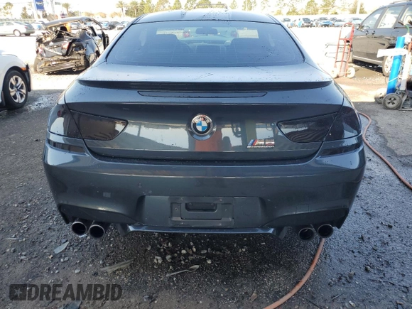 2015 BMW M6 z VIN WBSLX9C59FD160716, wystawiony jako Copart lot #47144925 z przebiegiem 55 535 mil mil oraz Szkody całkowita. Historia ofert i sprzedaży dostępna na DreamBid. Obrazek 6.