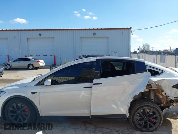 2023 Tesla Model X Plaid with VIN 7SAXCBE63PF405105, listed as a IAAI auction lot 41876918 with 22,475 mi miles and . Bid and sale history available at DreamBid. Image 15.
