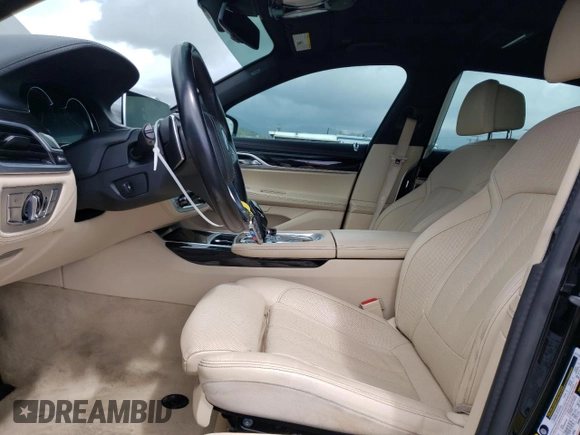 2016 BMW 7 Series 740i with VIN WBA7E2C54GG548312, listed as a Copart auction lot 45716263 with 74,249 mi miles. Bid and sale history available at carsss.com. Image 7.