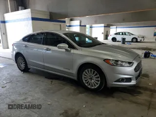 2013 Ford Fusion SE Hybrid with VIN 3FA6P0LU1DR368722, listed as a Copart auction lot 54738695 with 201,326 mi miles and Clean title. Bid and sale history available at DreamBid. Image 4.