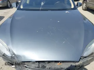 2014 Tesla Model S 60 with VIN 5YJSA1H18EFP38078, listed as a IAAI auction lot 42748619 with 159,285 mi miles and . Bid and sale history available at DreamBid. Image 10.