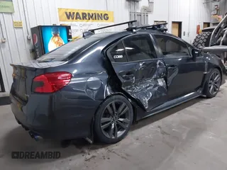2016 Subaru WRX Premium with VIN JF1VA1E69G8801517, listed as a IAAI auction lot 41558194 with 118,332 mi miles. Bid and sale history available at carsss.com. Image 4.