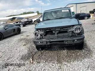 2021 Ford Bronco z VIN 1FMDE5BH0MLA96747, wystawiony jako Copart lot #57060985 z przebiegiem 37 048 mil mil oraz Szkoda całkowita • Salvage title. Historia ofert i sprzedaży dostępna na DreamBid. Obrazek 14.
