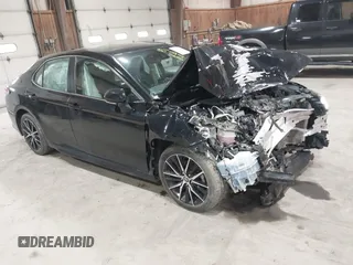 2021 Toyota Camry SE Nightshade with VIN 4T1T11AK2MU483971, listed as a IAAI auction lot 41934957 with 61,618 mi miles and . Bid and sale history available at DreamBid. Image 1.