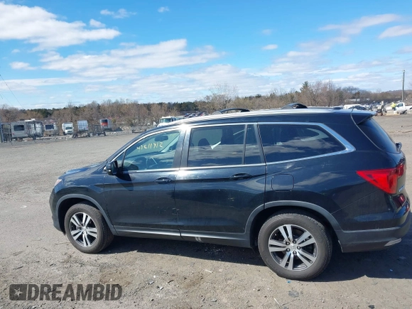 2016 Honda Pilot EX-L with VIN 5FNYF5H57GB023852, listed as a IAAI auction lot 41811412 with 151,707 mi miles and . Bid and sale history available at DreamBid. Image 14.