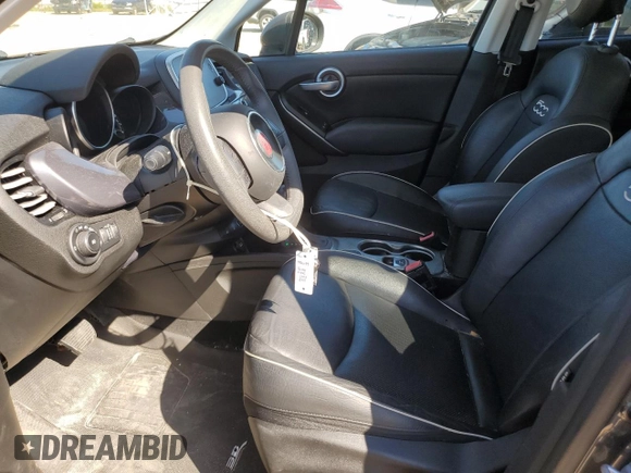 2018 FIAT 500X Lounge with VIN ZFBCFXDB5JP664130, listed as a Copart auction lot 73784574 with 67,160 mi miles and Salvage title. Bid and sale history available at DreamBid. Image 7.