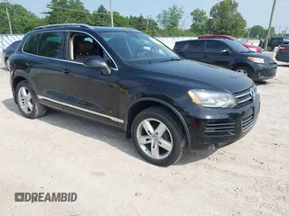 2012 Volkswagen Touareg Sport with VIN WVGFF9BP6CD005073, listed as a IAAI auction lot 42478038 with 120,343 mi miles and . Bid and sale history available at DreamBid. Image 1.