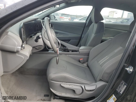 2024 Hyundai Elantra Hybrid Blue with VIN KMHLM4DJ7RU096240, listed as a Copart auction lot 41860415 with 30,631 mi miles and Salvage Title. Bid and sale history available at carsss.com. Image 7.