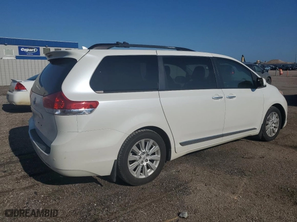 2012 Toyota Sienna XLE AAS with VIN 5TDYK3DC8CS207935, listed as a Copart auction lot 61867344 with 200,723 mi miles and Salvage Title. Bid and sale history available at carsss.com. Image 3.