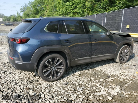 2023 Mazda CX-50 S Premium Plus with VIN 7MMVABEM0PN117875, listed as a Copart auction lot 59443705 with 40,946 mi miles and Salvage title. Bid and sale history available at DreamBid. Image 3.