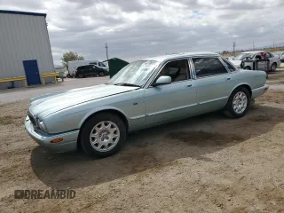 2001 Jaguar XJ with VIN SAJDA14C51LF34401, listed as a Copart auction lot 62036015 with Not provided miles and Salvage title. Bid and sale history available at DreamBid. Image 1.