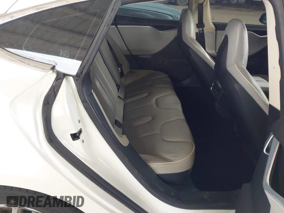 2013 Tesla Model S с VIN 5YJSA1CG8DFP22036, выставлен на аукционе IAAI как лот 41886249 с пробегом 125 477 миль миль и . История ставок и продаж доступна на DreamBid. Изображение 8.