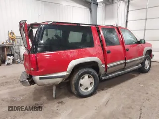 1999 GMC Suburban z VIN 1GKFK16R2XJ759130, wystawiony jako IAAI lot #40250336 z przebiegiem 235 141 mil mil oraz . Historia ofert i sprzedaży dostępna na DreamBid. Obrazek 4.