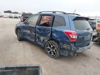2014 Subaru Forester XT Touring with VIN JF2SJGMC9EH428341, listed as a IAAI auction lot 41185804 with 111,000 mi miles and . Bid and sale history available at DreamBid. Image 3.