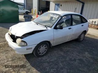 1994 Ford Aspire z VIN KNJLT06H5R6100247, wystawiony jako Copart lot #43331745 z przebiegiem 154 173 mil mil oraz Nie do naprawy. Historia ofert i sprzedaży dostępna na DreamBid. Obrazek 1.