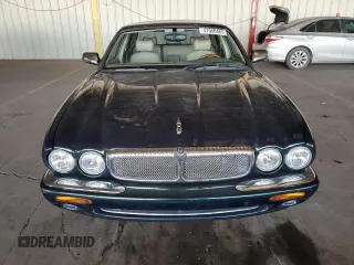 1999 Jaguar XJ with VIN SAJKX6046XC855872, listed as a Copart auction lot 47060465 with 65,286 mi miles and Clean title. Bid and sale history available at DreamBid. Image 5.