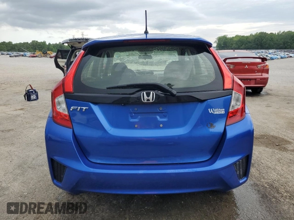2016 Honda Fit LX with VIN JHMGK5H51GX023597, listed as a Copart auction lot 54264975 with 83,528 mi miles and Salvage Title. Bid and sale history available at carsss.com. Image 6.