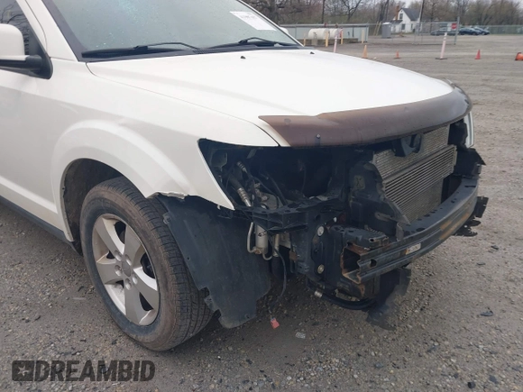 2012 Dodge Journey SXT with VIN 3C4PDCCG6CT132457, listed as a IAAI auction lot 41907657 with 169,160 mi miles and . Bid and sale history available at DreamBid. Image 13.