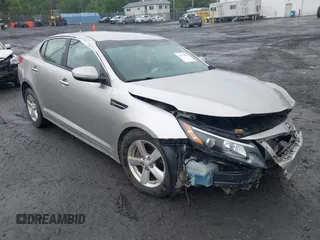 2014 Kia Optima LX with VIN KNAGM4A71E5478909, listed as a IAAI auction lot 42512809 with 223,720 mi miles and . Bid and sale history available at DreamBid. Image 1.