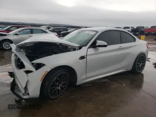 2020 BMW M2 Competition with VIN WBS2U7C01L7D66378, listed as a Copart auction lot 86432704 with 56,973 mi miles and Salvage Title. Bid and sale history available at carsss.com. Image 1.