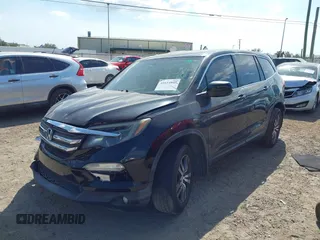 2016 Honda Pilot EX-L with VIN 5FNYF6H74GB048649, listed as a IAAI auction lot 41614843 with 132,264 mi miles. Bid and sale history available at carsss.com. Image 19.
