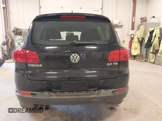 2014 Volkswagen Tiguan SE z VIN WVGAV3AX9EW614094, wystawiony jako IAAI lot #42350601 z przebiegiem 128 996 mil mil oraz . Historia ofert i sprzedaży dostępna na DreamBid. Obrazek 17.