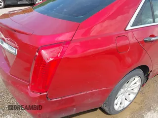 2014 Cadillac CTS AWD z VIN 1G6AW5SX3E0129127, wystawiony jako IAAI lot #42193399 z przebiegiem 108 037 mil mil oraz . Historia ofert i sprzedaży dostępna na DreamBid. Obrazek 19.