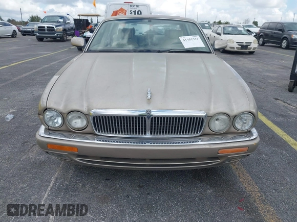1997 Jaguar XJ with VIN SAJHX1243VC811786, listed as a IAAI auction lot 41451521 with Not provided miles and . Bid and sale history available at DreamBid. Image 6.