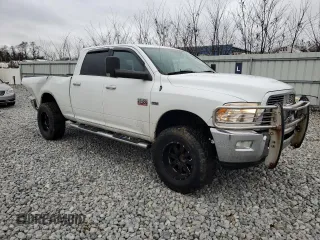 2010 Dodge 2500 Power Wagon with VIN 3D7TT2CT8AG128978, listed as a Copart auction lot 83987944 with 129,526 mi miles and Salvage Title. Bid and sale history available at DreamBid. Image 4.