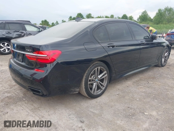 2017 BMW 7 Series ALPINA B7 xDrive with VIN WBA7F2C51HG422066, listed as a IAAI auction lot 42496292 with 118,235 mi miles and . Bid and sale history available at DreamBid. Image 4.