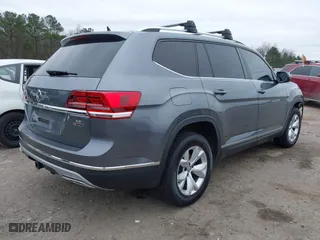2018 Volkswagen Atlas 3.6L V6 SEL with VIN 1V2MR2CA7JC543769, listed as a IAAI auction lot 41479621 with 122,699 mi miles. Bid and sale history available at carsss.com. Image 4.