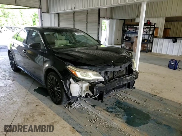2016 Toyota Avalon Limited with VIN 4T1BK1EB9GU216124, listed as a Copart auction lot 54565495 with 192,136 mi miles and Salvage Title. Bid and sale history available at DreamBid. Image 14.