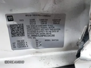 2023 Buick Encore GX Select with VIN KL4MMDS28PB154198, listed as a IAAI auction lot 42206254 with 23,392 mi miles and . Bid and sale history available at DreamBid. Image 9.